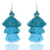 trendy tassel oredobber i mosegront